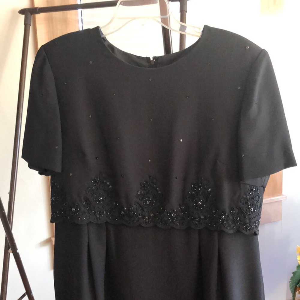 Ladies long black dress Sz 16.  With beading on the bodice and sleeves.